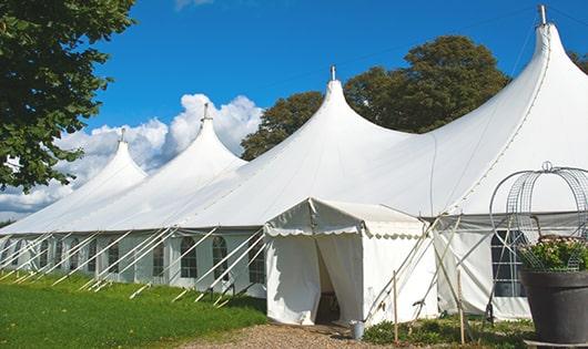 a group of luxury portable toilets with individual stalls and running water in Winchester OR